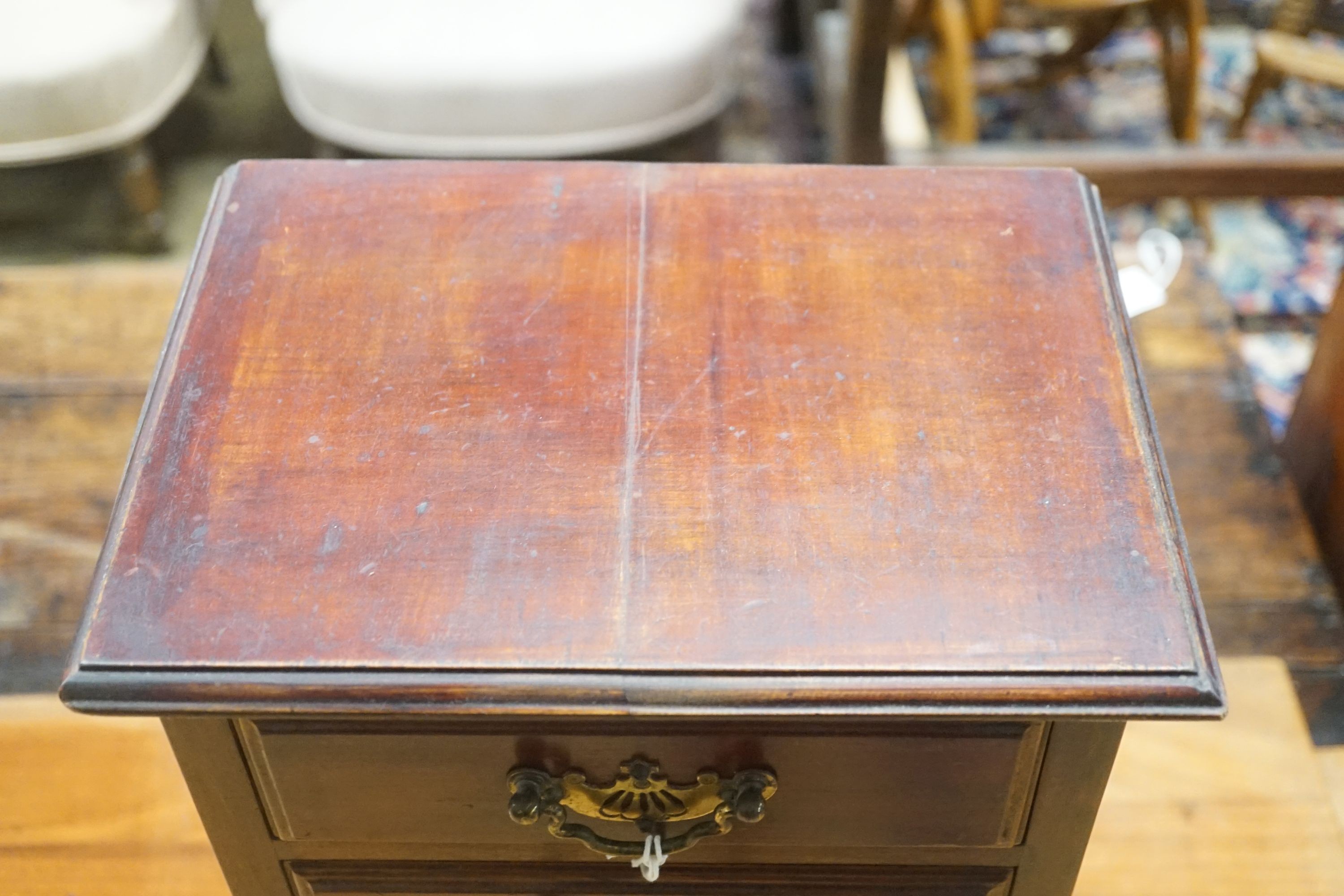 A late Victorian mahogany miniature four drawer chest, width 28cm depth 28cm height 42cm